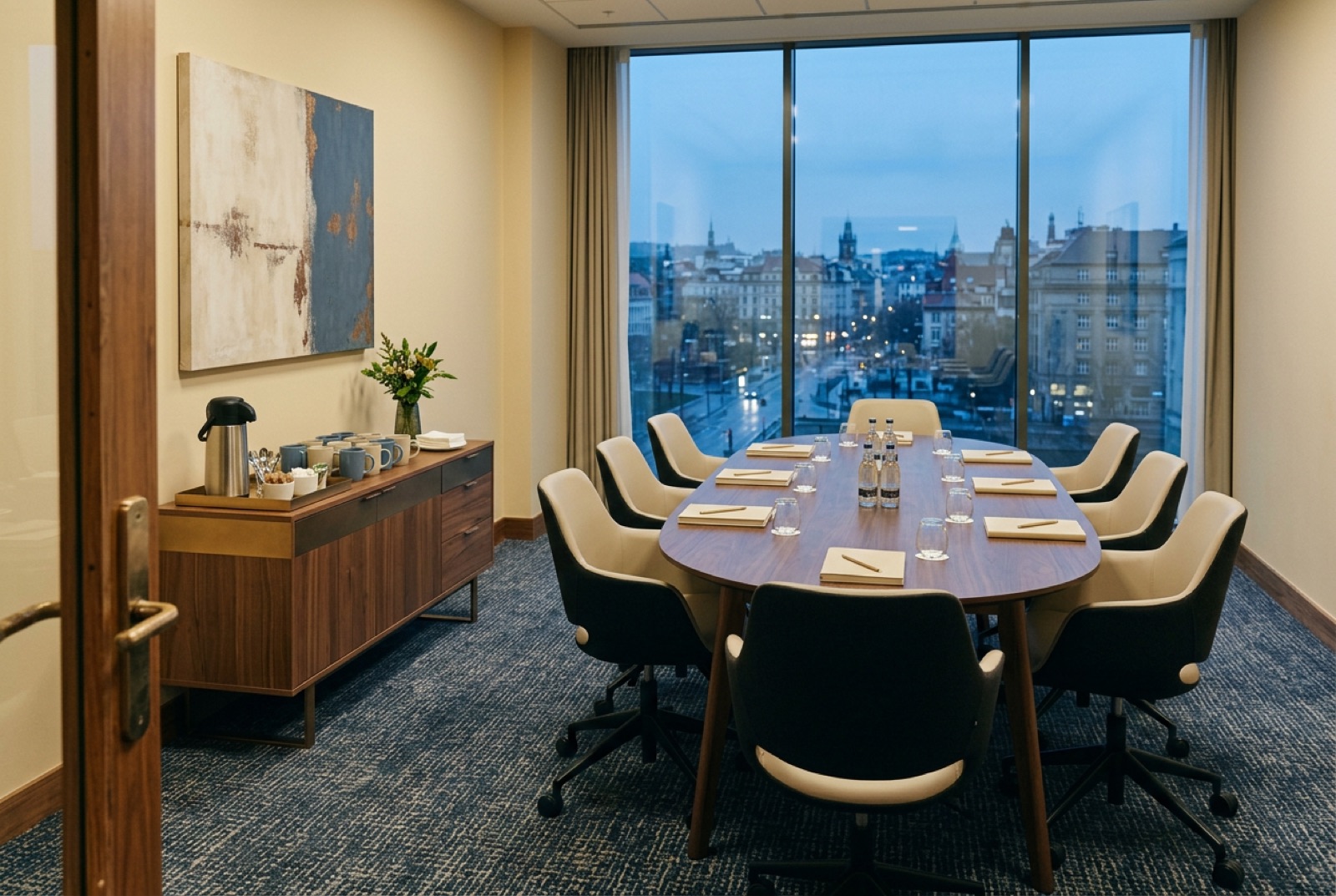 A hotel meeting suite set for a peer group