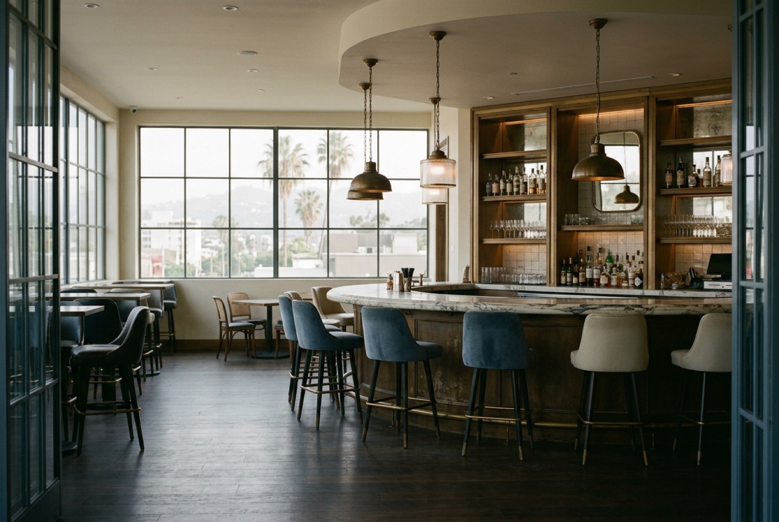 A club bar with a marble counter and low lamps in the afternoon