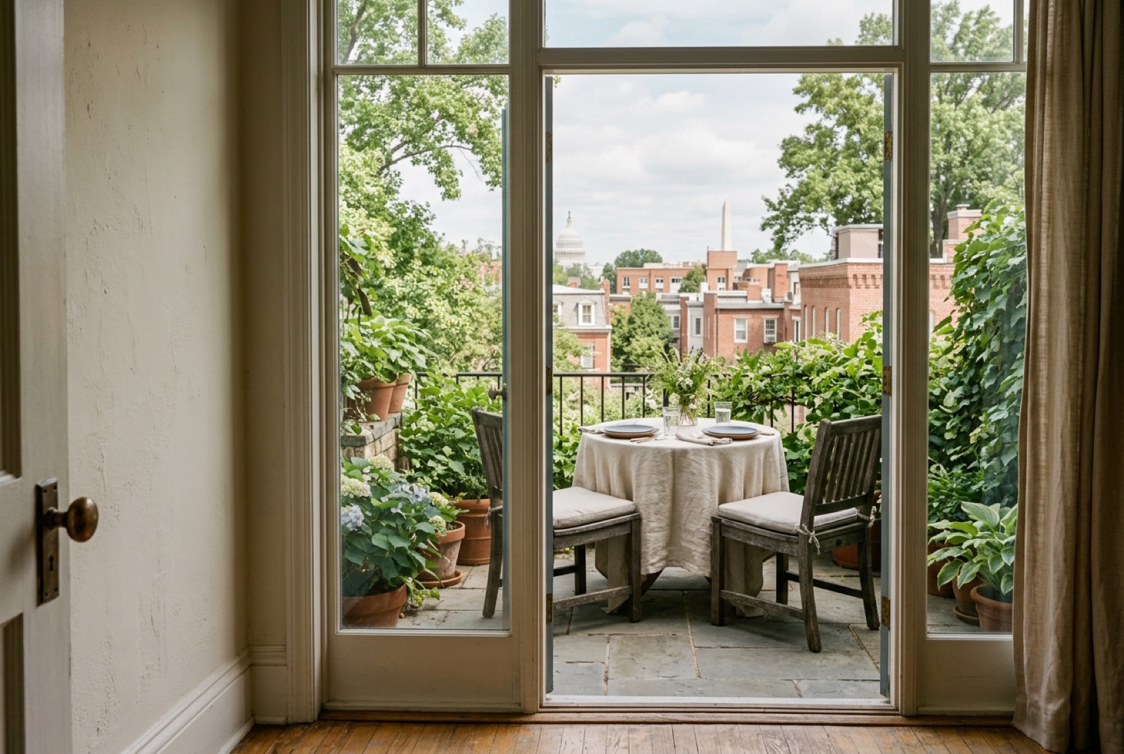 A hidden garden terrace with a single set table